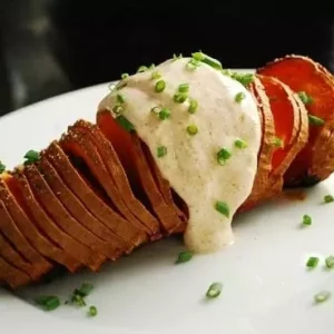 sliced sweet potato with chipotle yogurt sauce