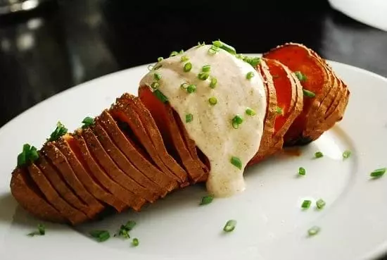 sliced sweet potato with chipotle yogurt sauce