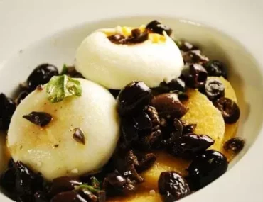 poached eggs over polenta and olive tapenade